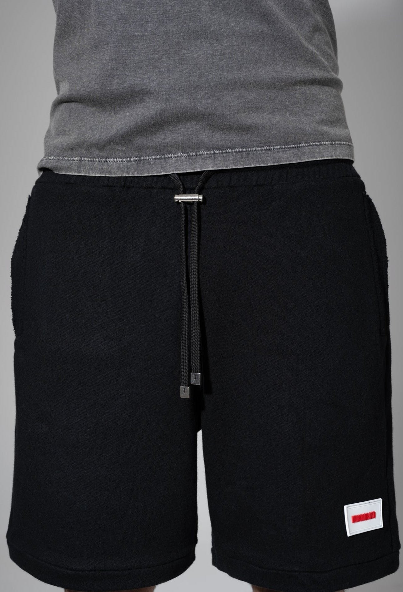 Shorts with rubberized logo patch from innamoratoclo.com