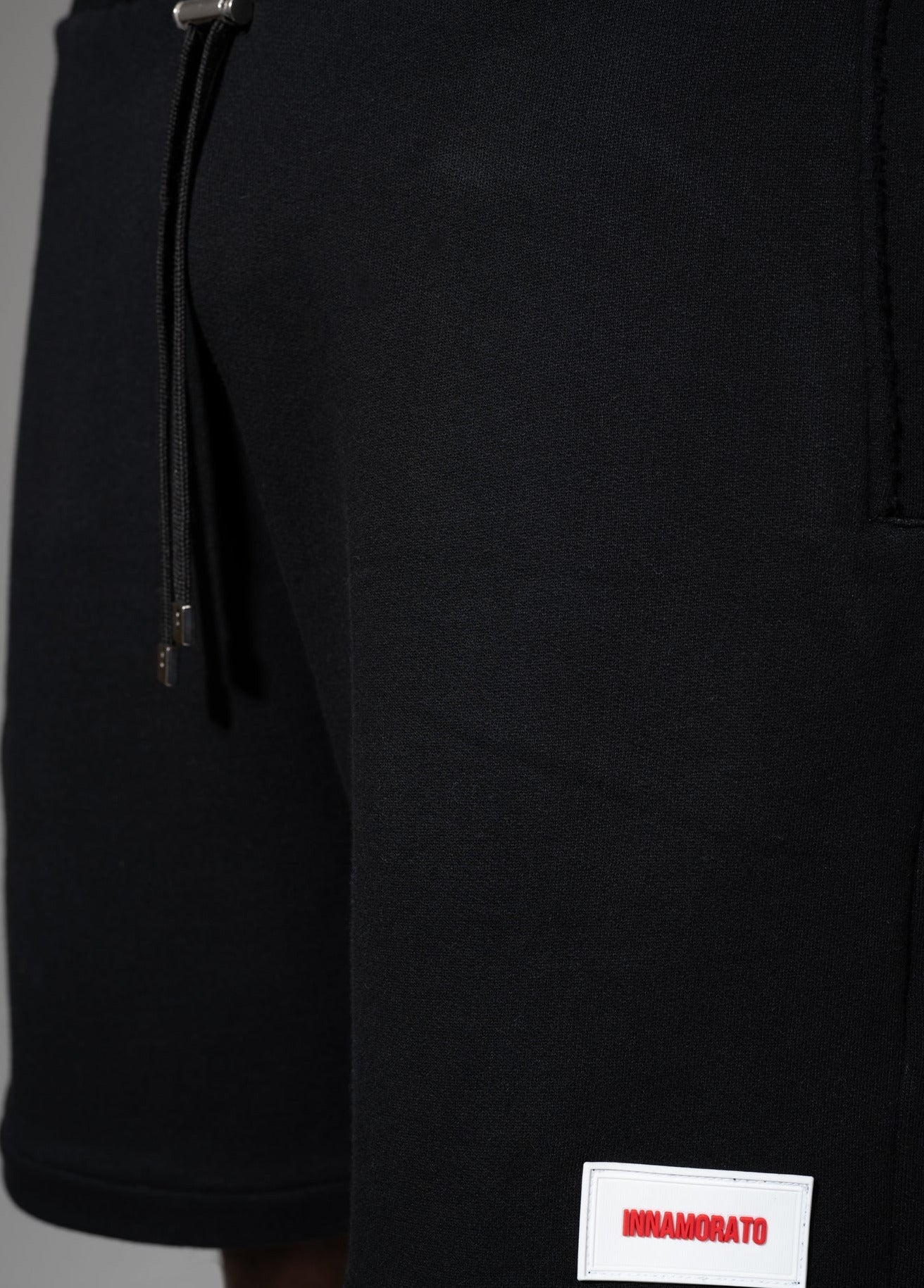 Shorts with rubberized logo patch from innamoratoclo.com