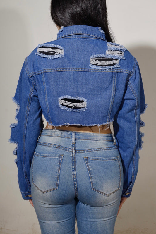 Dark ripped wash cropped denim jacket on model from https://innamoratoclo.com