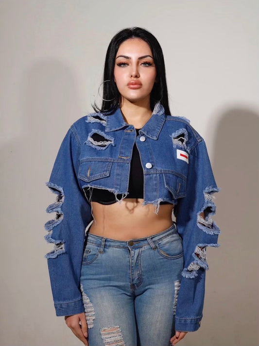 Dark ripped wash cropped denim jacket on model from  https://innamoratoclo.com