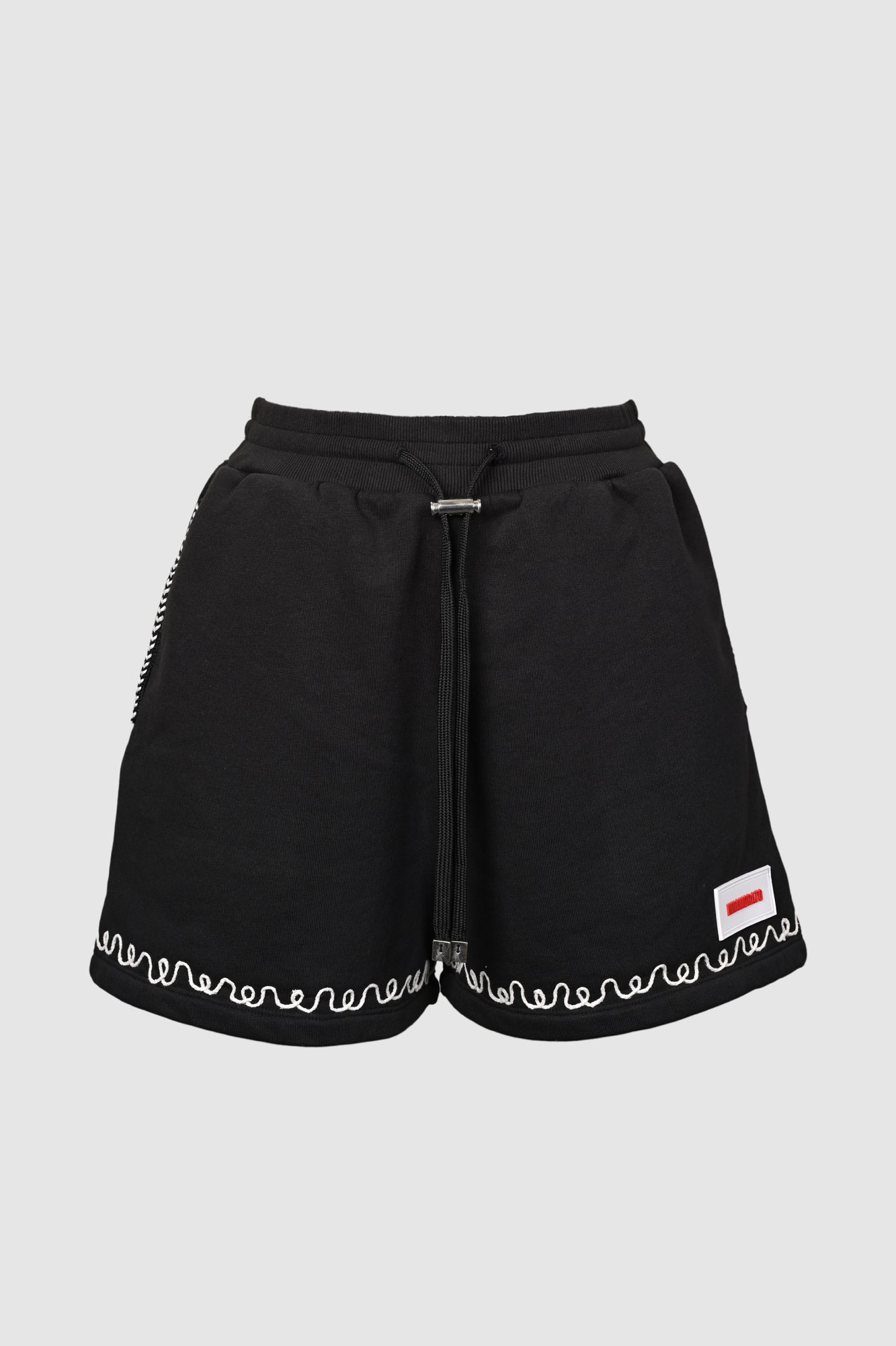 Patterned sweatshorts with rubberized logo patch from innamoratoclo.com