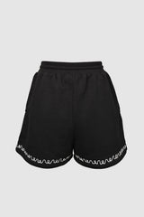 Patterned sweatshorts with rubberized logo patch from innamoratoclo.com