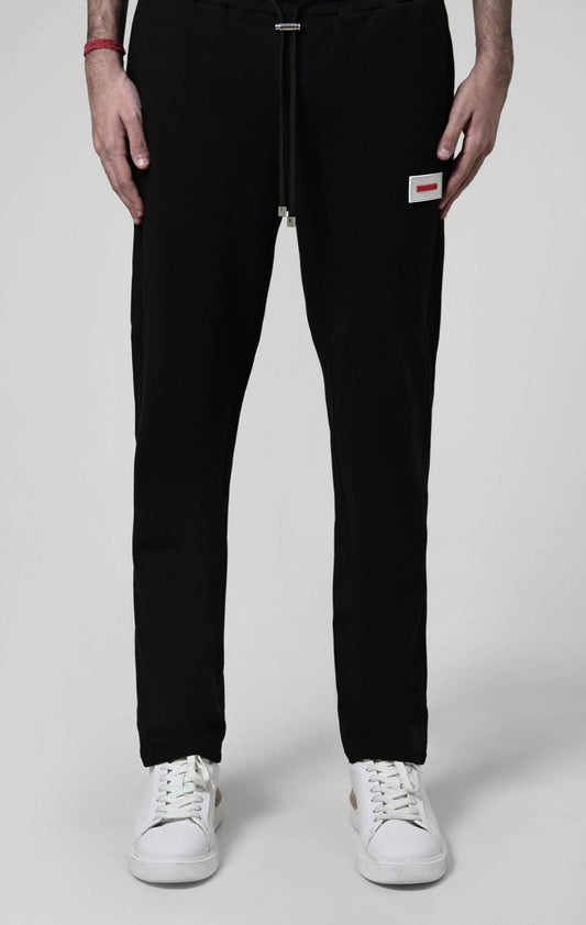 Sweatpants with rubberized logo patch from innamoratoclo.com