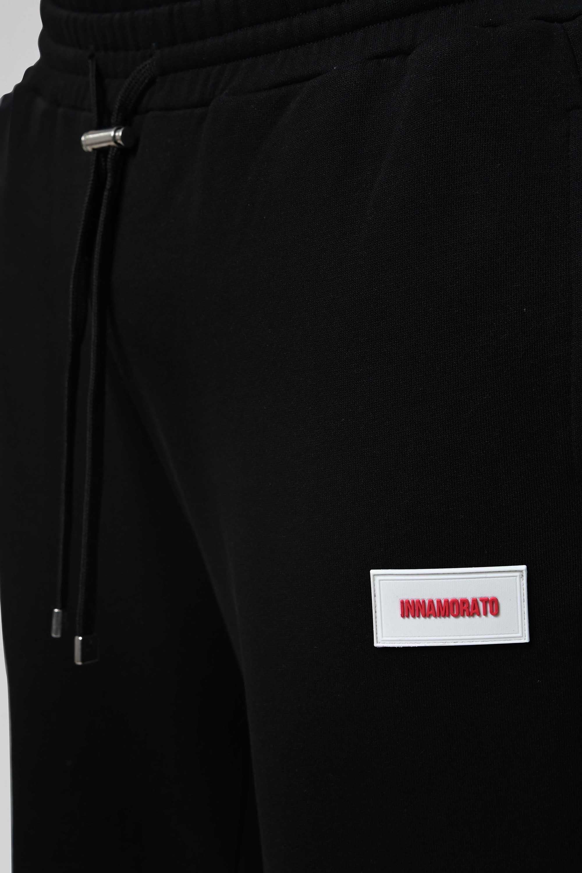 Sweatpants with rubberized logo patch from innamoratoclo.com